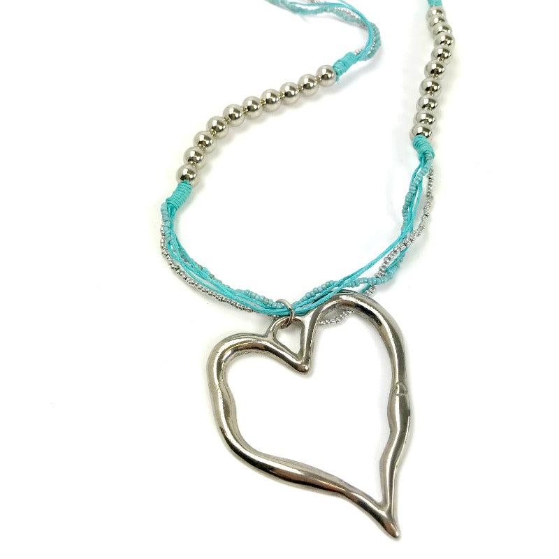 Heart pendant necklaces - silver pendant - beaded blue strand